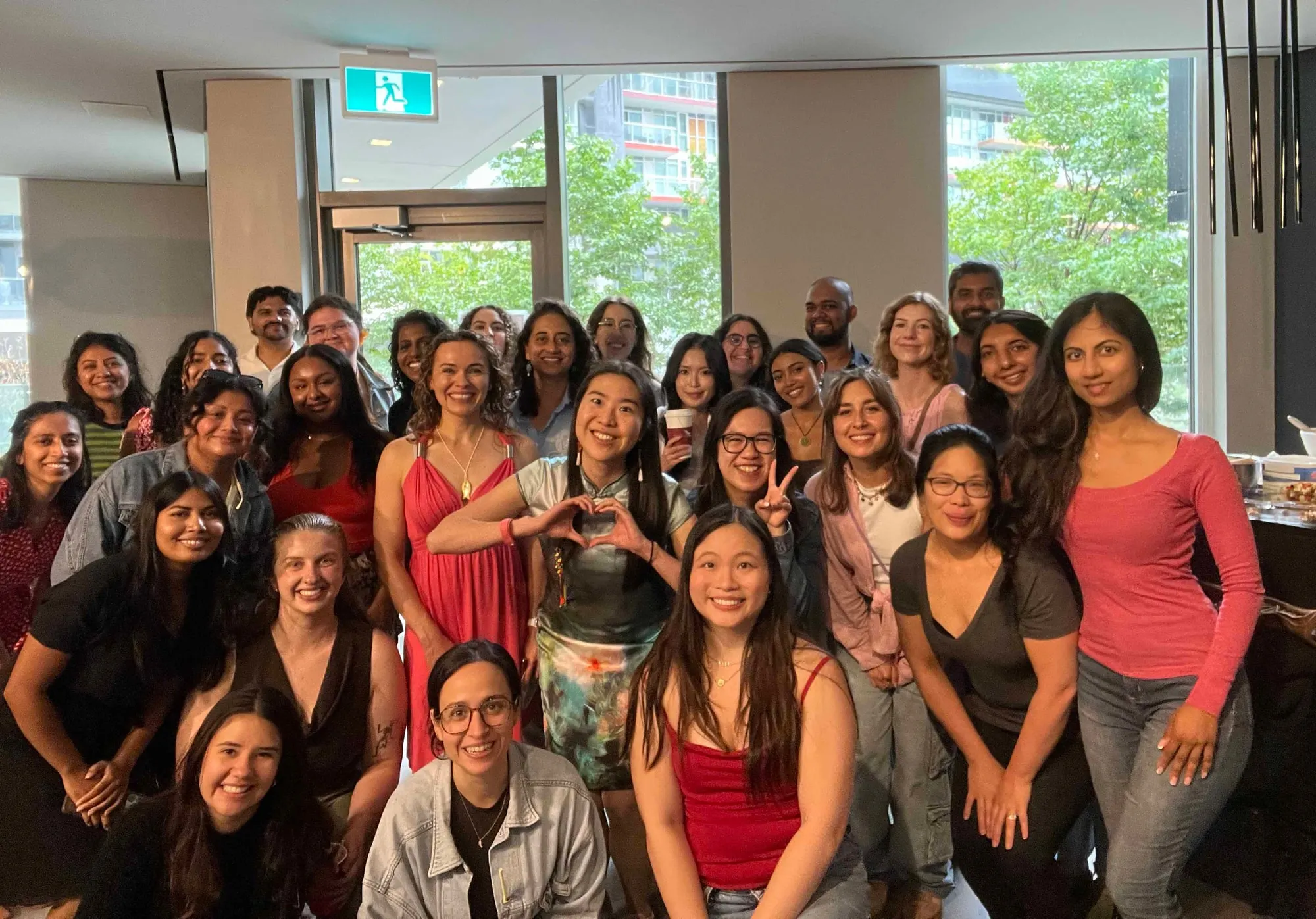 The room at the August Sauté Sundays, everyone in for a group photo.